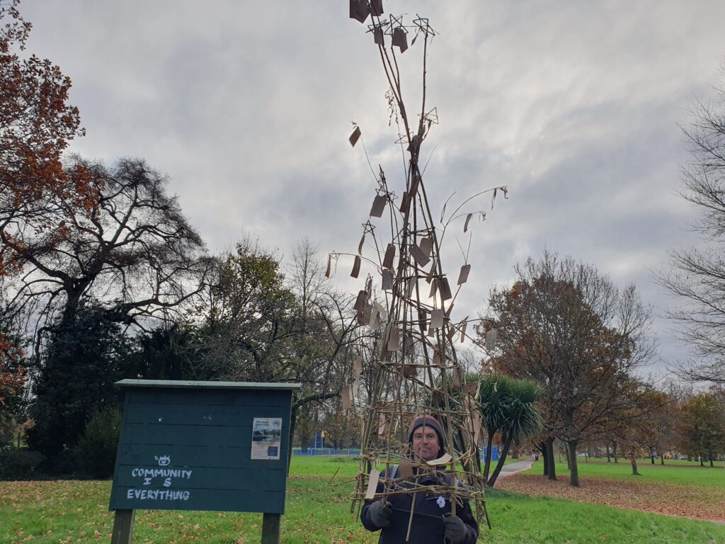 Tree of Hope in a Park with sign - 'Community is everything'